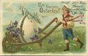Postkarte - Ein frohes Osterfest - Junge im Matrosenanzug mit Schubkarre Ei und Veilchen