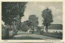 Postkarte - Gosen - Dorfstrasse mit Storchennest ca. 1930