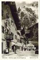 Fotokarte - Mittenwald - Adlerhaus gegen Karwendelgebirge